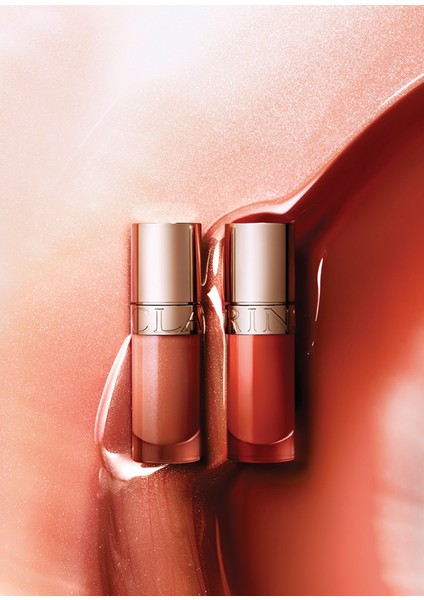 Lip Comfort Oil Clarins x Austin Li 27 Fleeting Dew Dudak Parlatıcısı 7 ml fiyatları