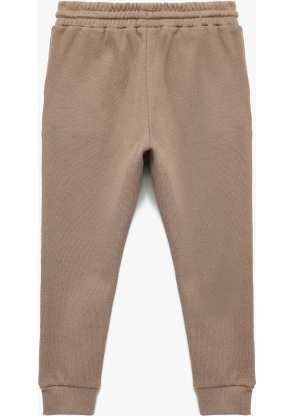 Pamuklu Cepli Beli Bağlamalı Jogger Eşofman Altı fiyatları