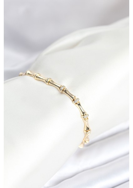 Pirinç Gold Renk Kemik Model Zirkon Taşlı Kadın Bileklik