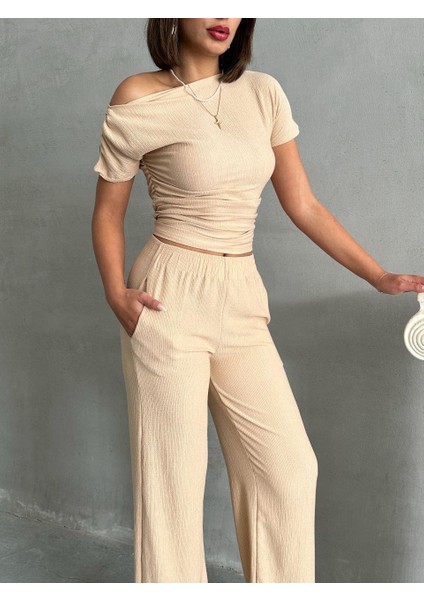 Tek Omuz Crop ve Bol Paça Pantolon Takım indirimleri