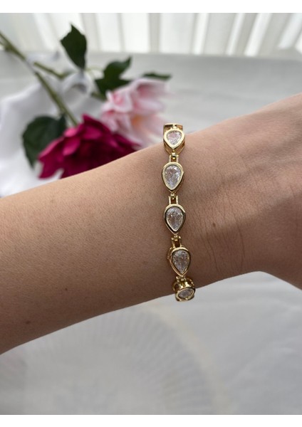 Çelik Zirkon Taşlı Damla Model Altın Renk Bileklik modelleri