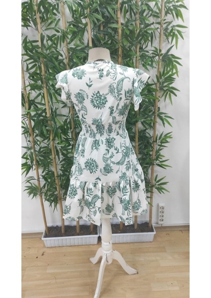 Kadın Kısa Fırfır Kollu Kruvaze Yaka Çiçekli Atlas Elbise