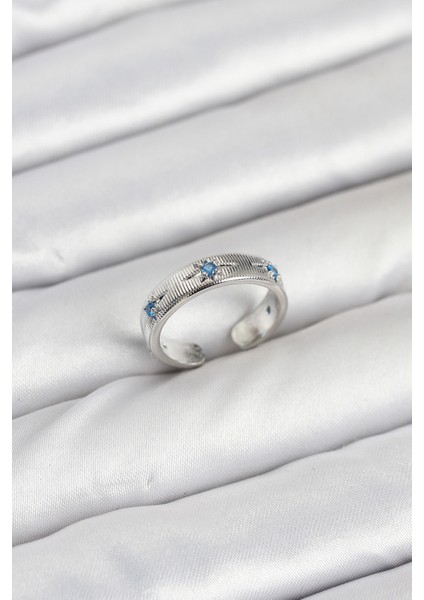 Pirinç Gümüş Renk Mavi Zirkon Taşlı Kutup Yıldızı Model Kadın Yüzük