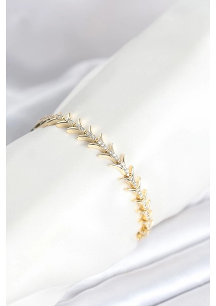 Pirinç Gold Renk Balık Sırtı Model Zirkon Taşlı Kadın Bileklik