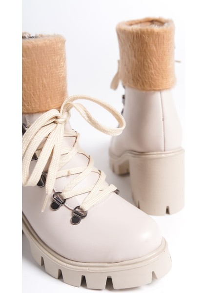 Emma Bağcıklı Fermuarlı Ortopedik Taban Topuklu Kürk Detaylıkadın Bot Ckt - Krem indirimleri