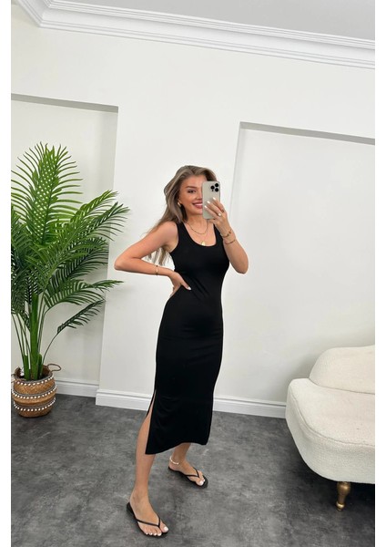 Kadın Çift Yırtmaç Detaylı Sıfır Kol Midi Boy Elbise fırsatları