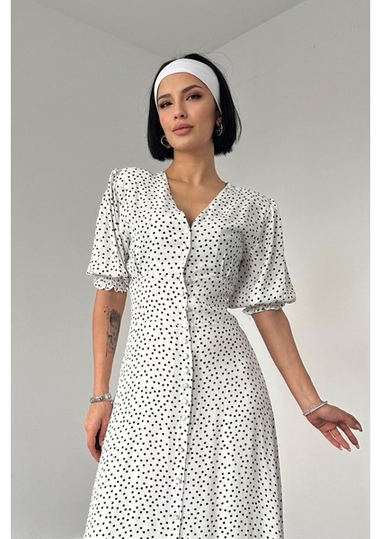 Beyaz Arka ve Bel Ucu Gipeli Elbise fiyatları