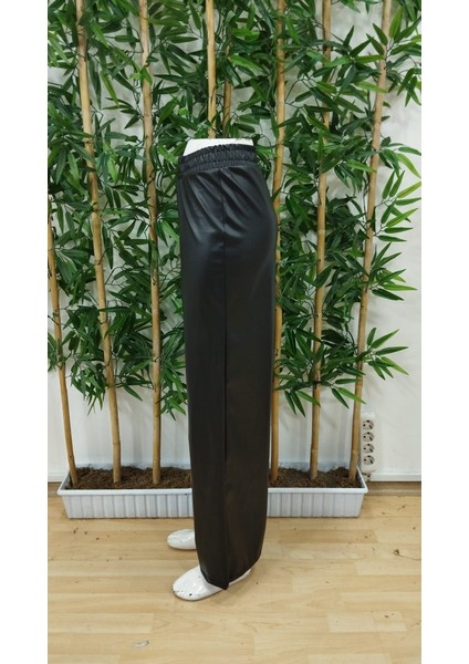 Kadın Yüksek Bel Beli Lastikli Geniş Paçalı Deri Pantolon