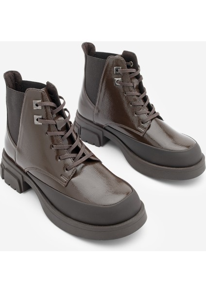 Kadın Bağcıklı Lastikli Kalın Topuklu Kısa Postal Bot Kenvo indirimleri