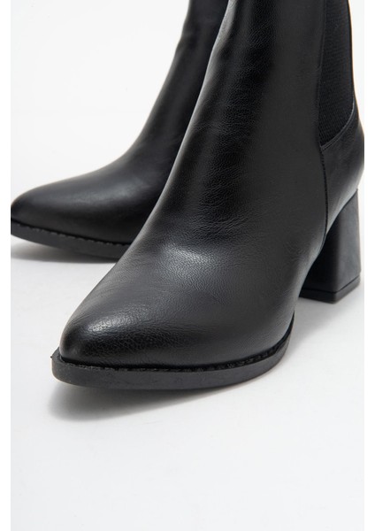 Kadın Sade Lastikli Sivri Burunlu Topuklu Bot Siyah Cilt modelleri