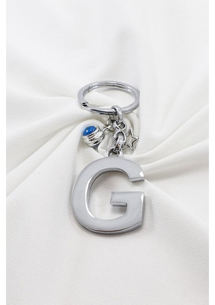 Çerçeveli Nazarlı Minik Yıldızlı Gümüş Renkli Metal G Harfi Anahtarlık / Hediyelik Çanta Süsü modelleri