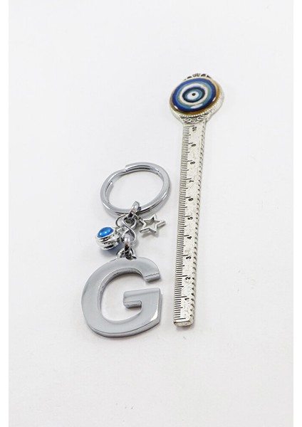 Çerçeveli Nazarlı Minik Yıldızlı Gümüş Renkli Metal G Harfi Anahtarlık / Hediyelik Çanta Süsü indirimleri