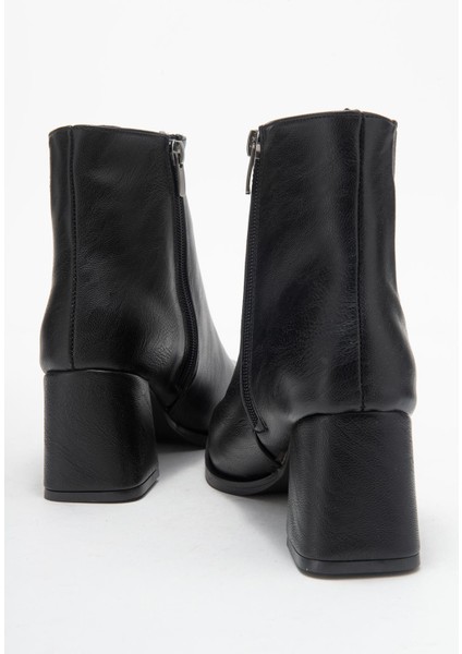 Küt Burunlu Sade Lastikli Kadın Topuklu Bot Siyah Cilt fırsatları