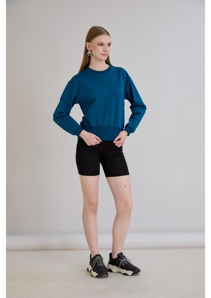 Eteği Üç Düğmeli ve Kaşkorseli Bisiklet Yaka Sweatshirt Petrol fiyatları