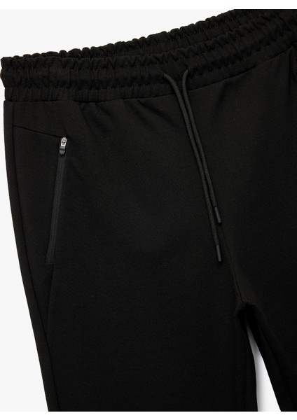 Fermuarlı Cepli Beli Bağcıklı Viskon Karışımlı Spor Jogger Eşofman Altı modelleri