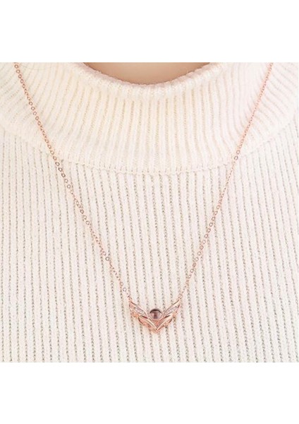 Pembe Zirkon Taşlı Kanat Desenli Şık Projeksiyon Zincir Kolye fiyatları