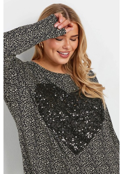 Büyük Beden Yırtmaç Detaylı Puantiyeli Payetli Uzun Kollu Bisiklet Yaka Bluz 322269 fiyatları