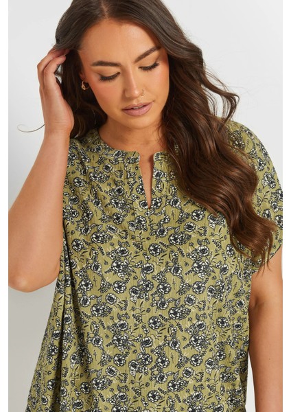 Büyük Beden Çentik Yaka Kısa Kollu Eteği Asimetrik Kesim Desenli Bluz 303867 indirimleri