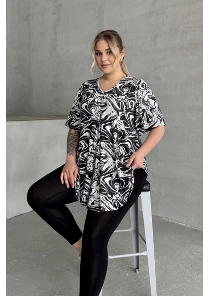Büyük Beden V Yaka Kısa Kollu Eteği Bollaşan Desenli Bluz 101-17 indirimleri