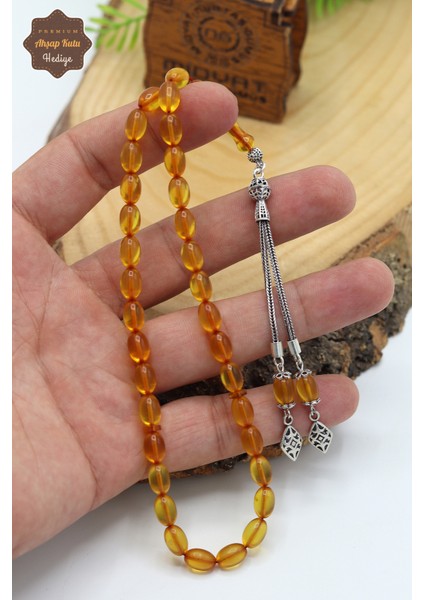 Sarı Arpa Kesim Gümüş Püsküllü Ateş Kehribar Tesbih 201024571 fırsatları