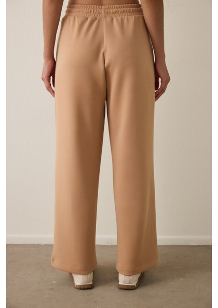Açık Kahverengi Modal Düz Paça Yüksek Bel Önü Cepli Pantolon fiyatları
