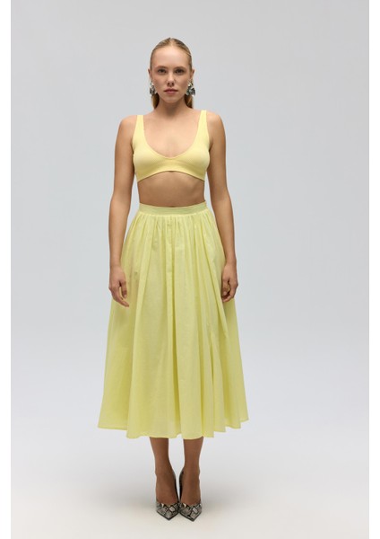 Amaya Bilek Hizasında Pileli Sarı Etek modelleri