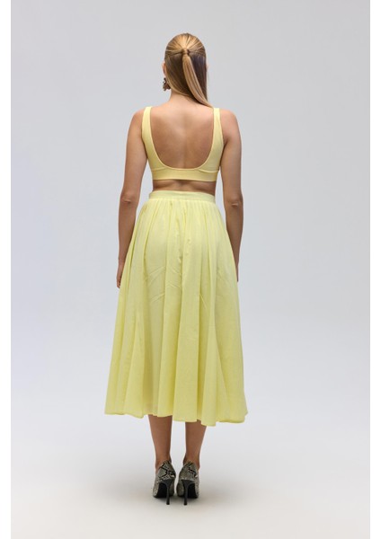 Amaya Bilek Hizasında Pileli Sarı Etek indirimleri