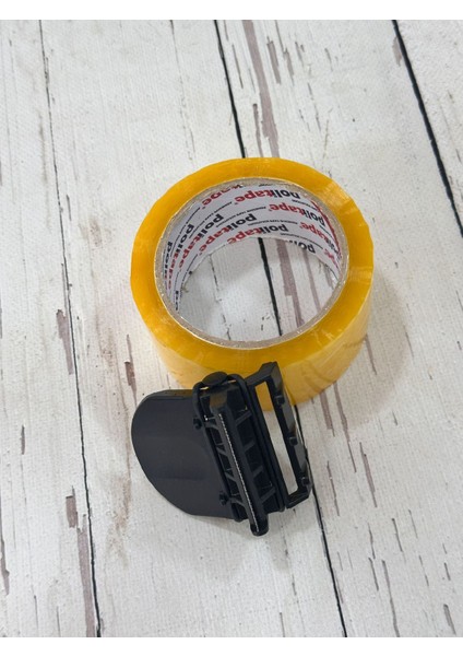 Koli Bandı (4,5cm x 100 Metre) ve Kesme Aparatı fırsatları