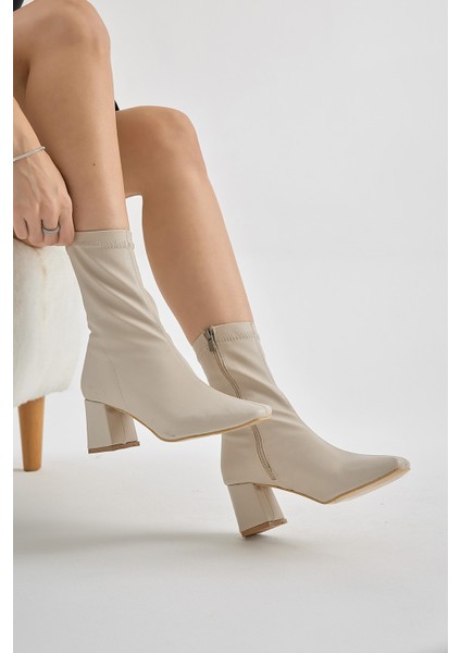 Kadın Bej Tpu Taban Küt Burunlu Fermuarlı Topuklu Bot