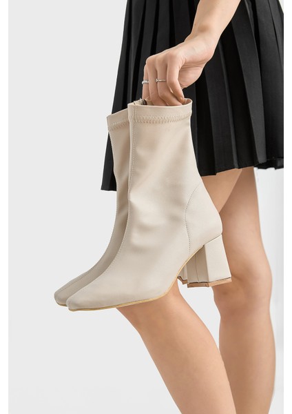 Kadın Bej Tpu Taban Küt Burunlu Fermuarlı Topuklu Bot fırsatları