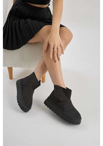 Kadın Siyah Kalın Poli Taban Içi Kürklü Cırtlı Bot modelleri