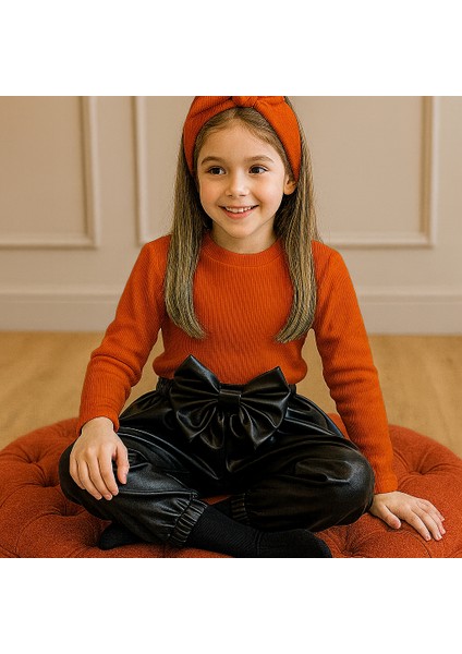 kız Çocuk, 3 Lü Set Siyah Deri Fiyonk Detaylı Pantolon, Turuncu Omuzu Fırfırlı Badi ve Saç Bandı Takımı. fiyatları