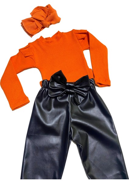 kız Çocuk, 3 Lü Set Siyah Deri Fiyonk Detaylı Pantolon, Turuncu Omuzu Fırfırlı Badi ve Saç Bandı Takımı.
