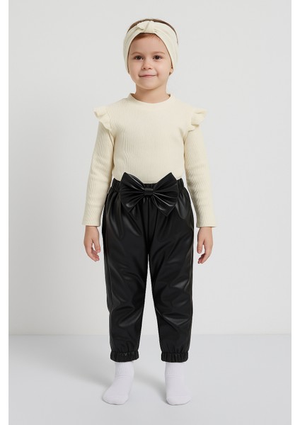 Kız Çocuk, Siyah Deri Fiyonk Detaylı Pantolon, Krem Omuzu Fırfırlı Badi ve Saç Bandı Takımı