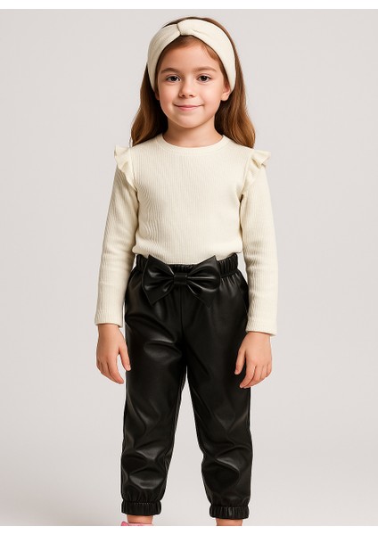 Kız Çocuk, Siyah Deri Fiyonk Detaylı Pantolon, Krem Omuzu Fırfırlı Badi ve Saç Bandı Takımı