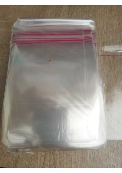 100 Adet 10X15 cm Bantlı Yapışkanlı Şeffaf Opp Jelatin Poşet ( 10X10+5) Şeffaf 10 x 15 100'LÜ Poşet modelleri