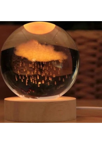 1205 Yağmur Bulut Temalı Oval Ahşap Kaideli LED Işıklı Cam Küre / 6 cm