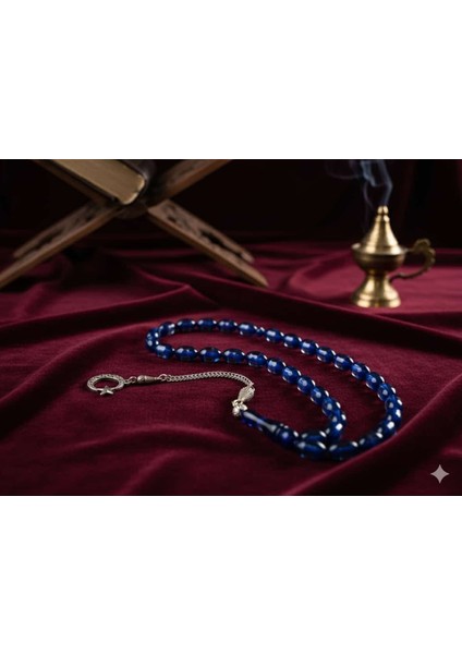 Beyzi Kesim Uçak Camı Tesbih: 12MM x 8mm Şeffaf Mavi