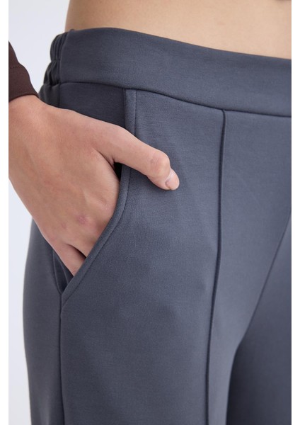 Önü Dikişli Geniş Paça Beli Lastikli Pantolon modelleri