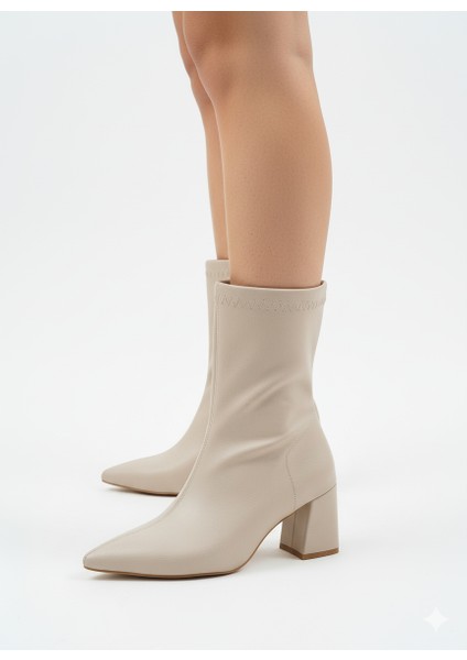 Kadın Düz Yanı Fermuarlı Sivri Burun Kalın Topuk Bot modelleri