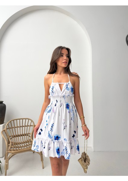 Mavi Çiçek Desenli Halter Yaka Büzgülü Mini Elbise fırsatları