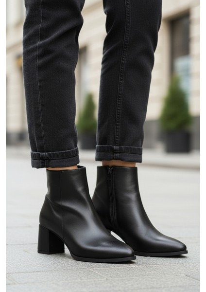 Siyah Cilt Fermuarlı Polarlı Kaymaz Kadın Topuklu Bot 343126 Z modelleri