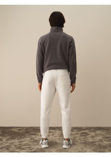 Erkek Kırık Beyaz Pamuk Dokulu Regular Fit Sweat Pantolon