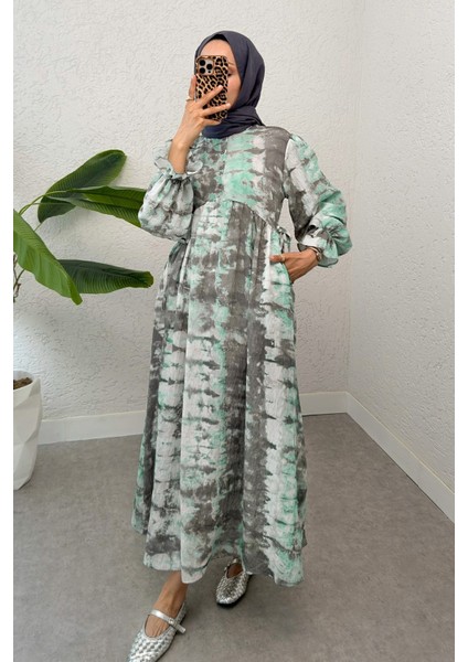 Yandan Bağcık Detaylı Kolları Lastikli Uzun Elbise