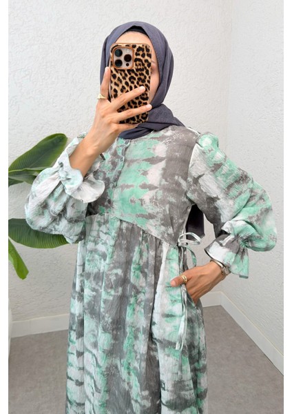 Yandan Bağcık Detaylı Kolları Lastikli Uzun Elbise modelleri