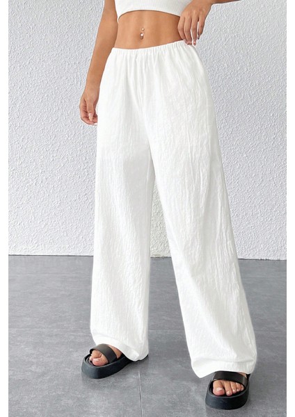 Kadın Beyaz Bol Kesim Cepli Geniş Paça Dökümlü Pantolon fırsatları