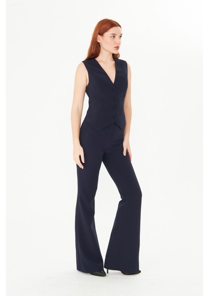 Kadın Lacivert Yelek ve Yüksek Bel İspanyol Paça Pantolon Takım – Modern Ofis Şıklığı & Klasik Zarafet fiyatları