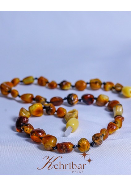 Ham Kehribar Bebek Kolye