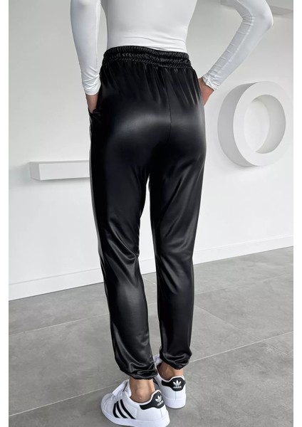 Kadın Bel ve Paça Lastikli Suni Deri Pantolon P-00018503 fırsatları