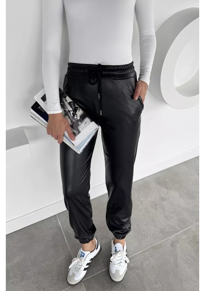 Kadın Bel ve Paça Lastikli Suni Deri Pantolon P-00018468